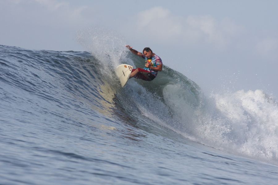 Surfer carving a wave at the Las Flores point break