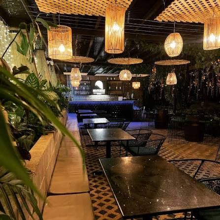 Monte Berat restaurant and bar seating at night