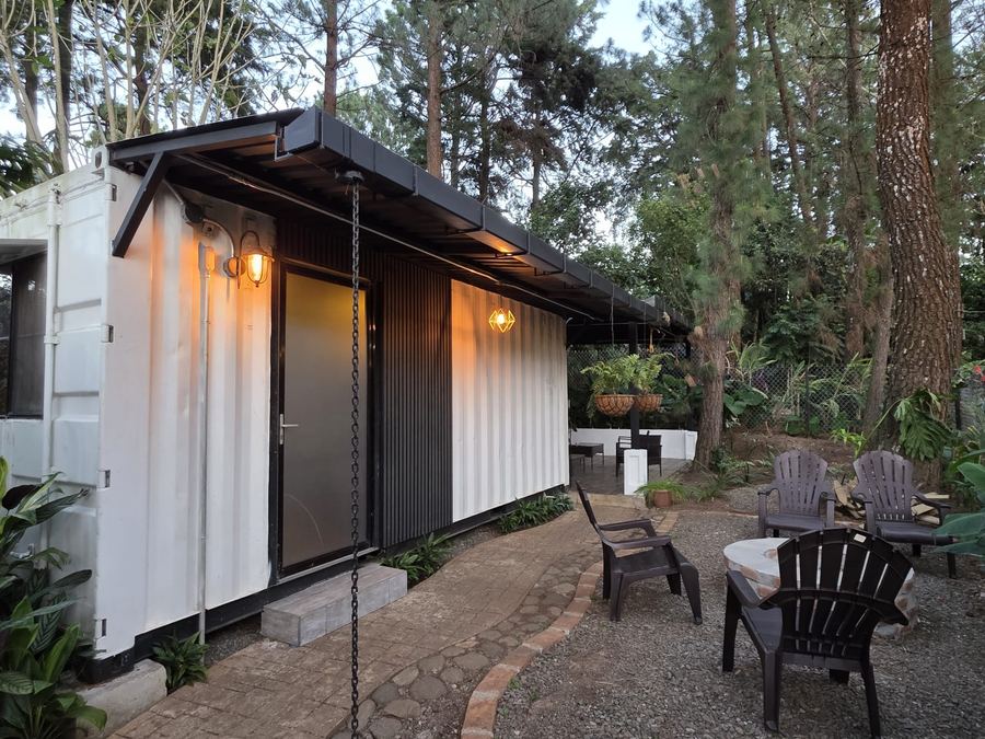 Modern container-style cabin terrace at Monte Berat