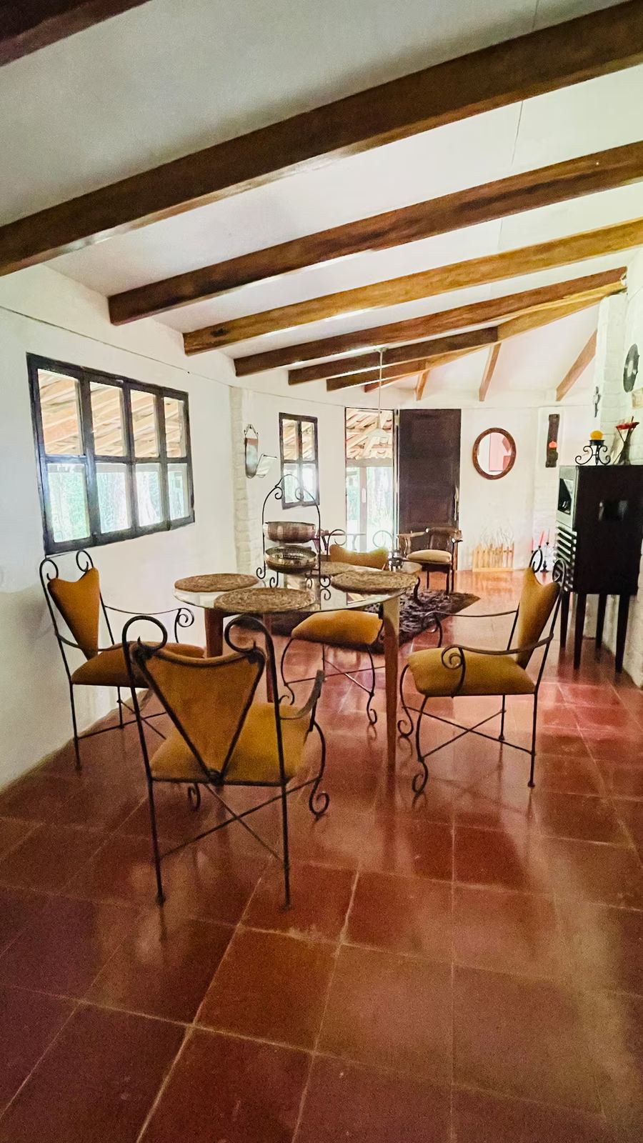Dining room with beamed ceiling at Monte Berat