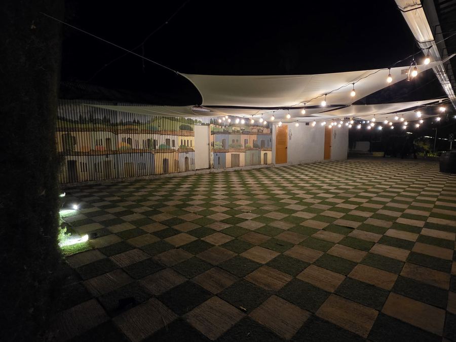 Outdoor event space at Monte Berat at night